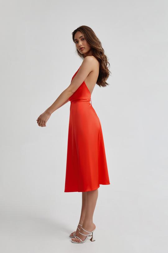 Model wearing Lexi Frankie orange one shoulder satin midi dress with split