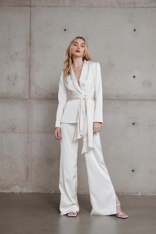 Model wearing Lexi Sade Jacket and Dosa Pant Set in Oyster Front