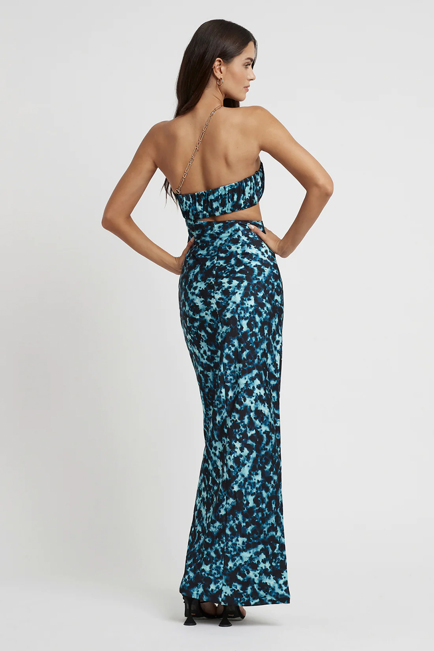 Back of Lexi Talia blue print gown showing removable crossover gold chain