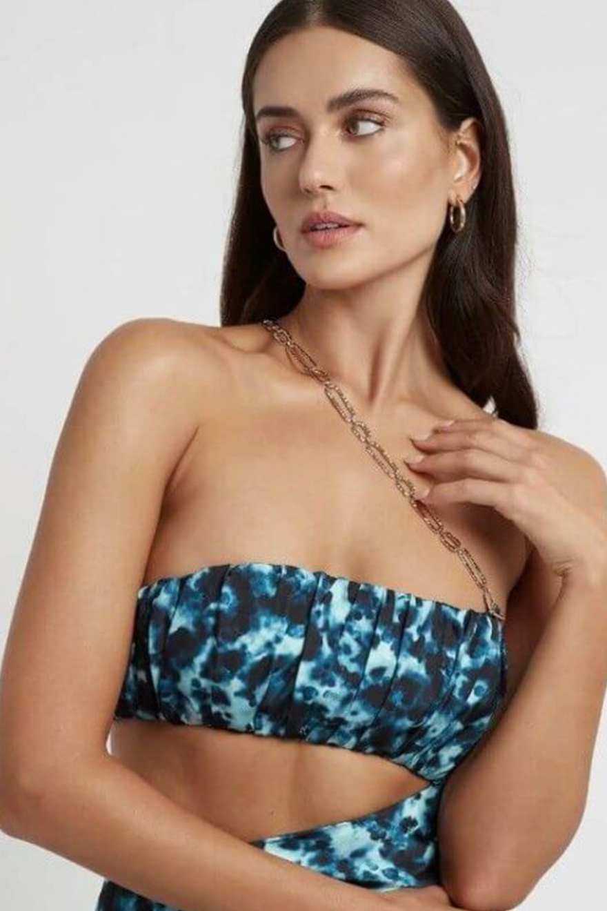 Close-up of gold chain back detail on Lexi Talia blue ink print gown