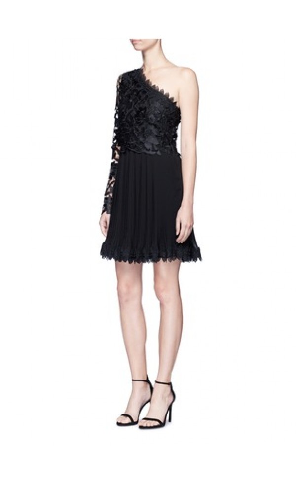 Model wearing Nicholas black botanical lace one shoulder dress with pleated skirt