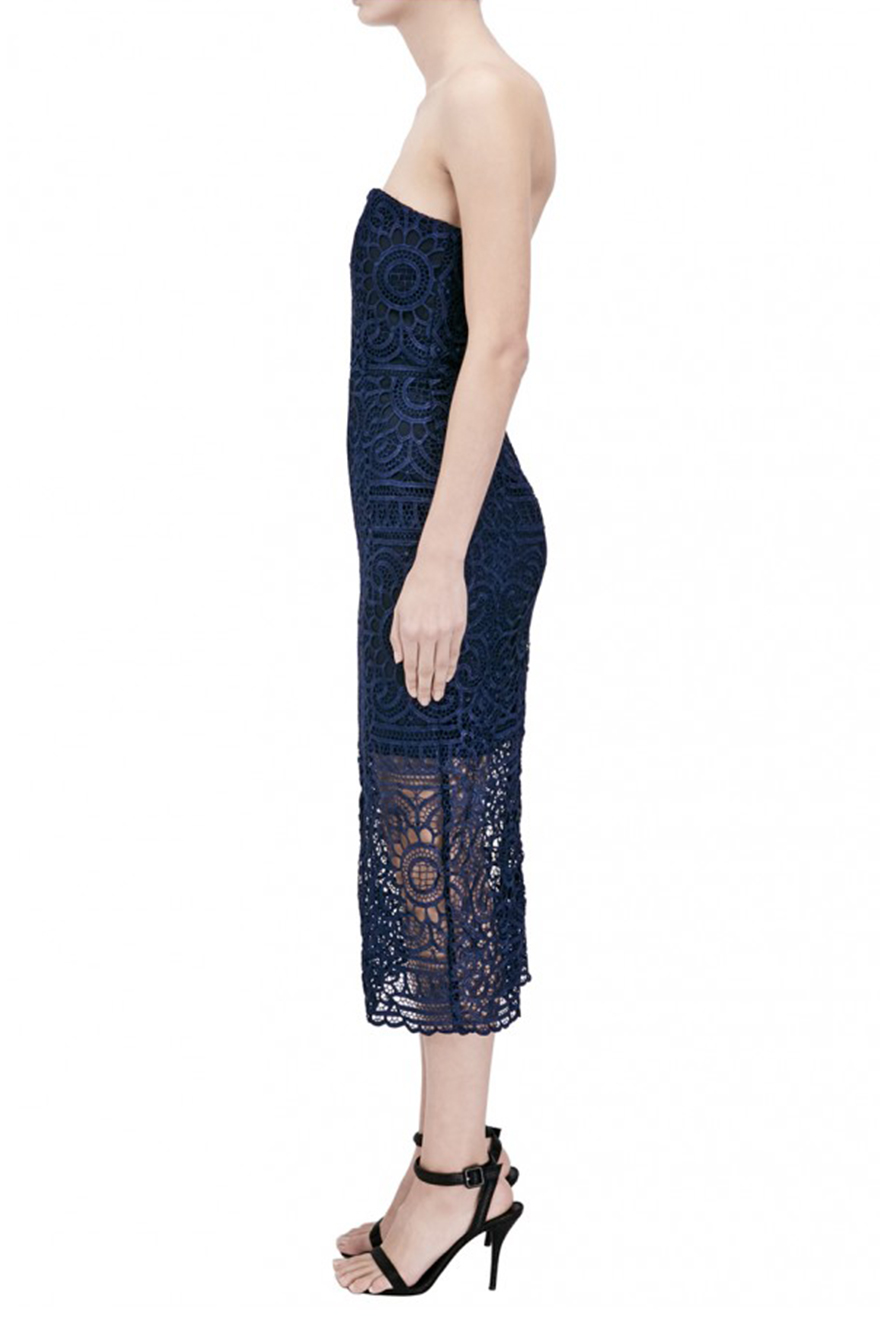 Model wearing Nicholas the Label navy floral lace strapless dress