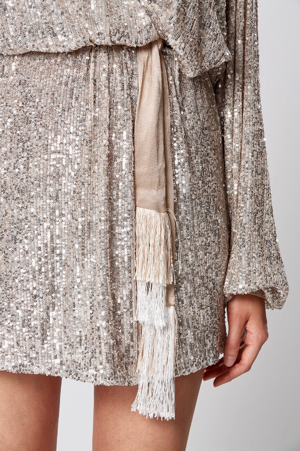 Close-up of silver micro-sequins and contrast cuff on Winona Broadway dress