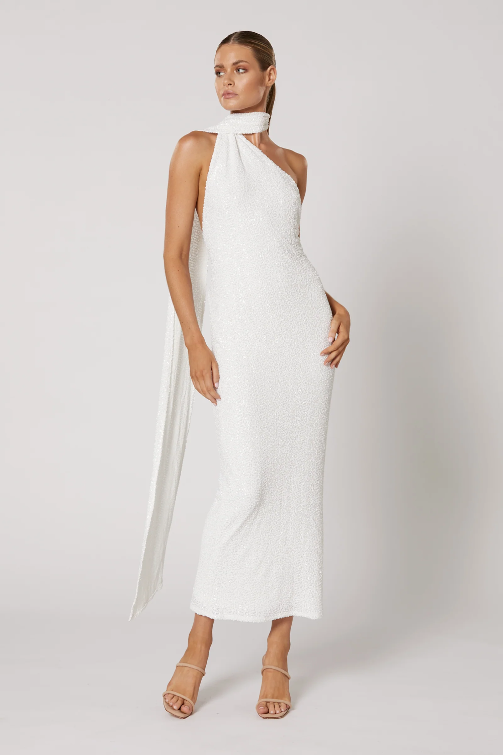 Winona Talei white sequin dress with one shoulder choker neckline and draped sash