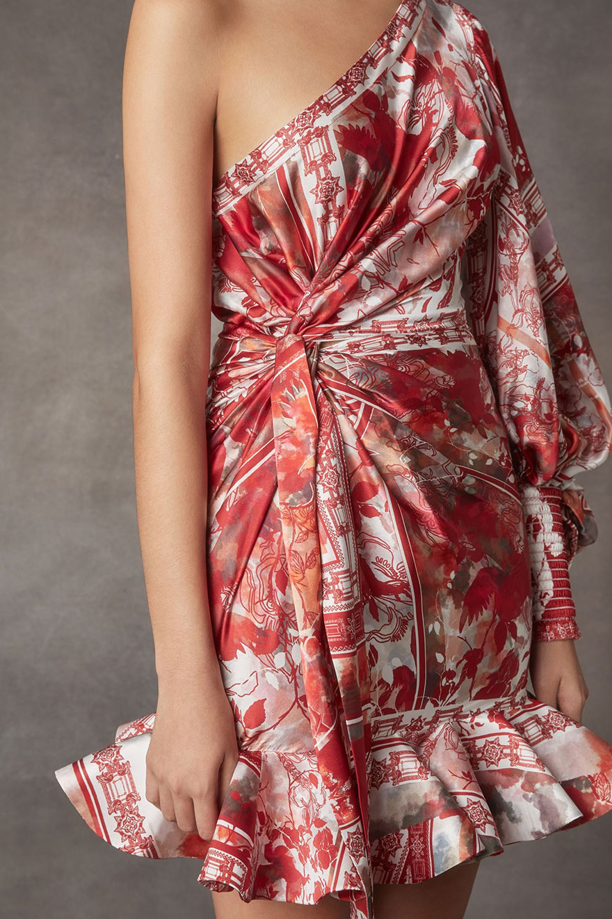 Close-up of ruffle hem on Leo Lin Imperial Draped silk linen mini dress