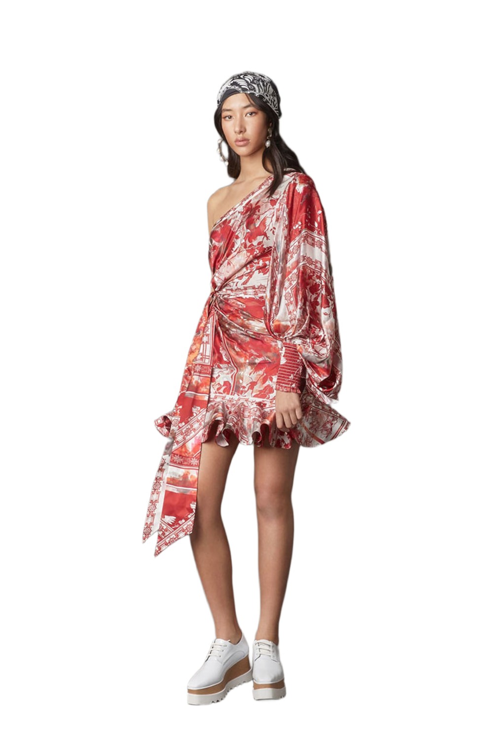 Model wearing Leo Lin Imperial Draped one shoulder mini dress in red print