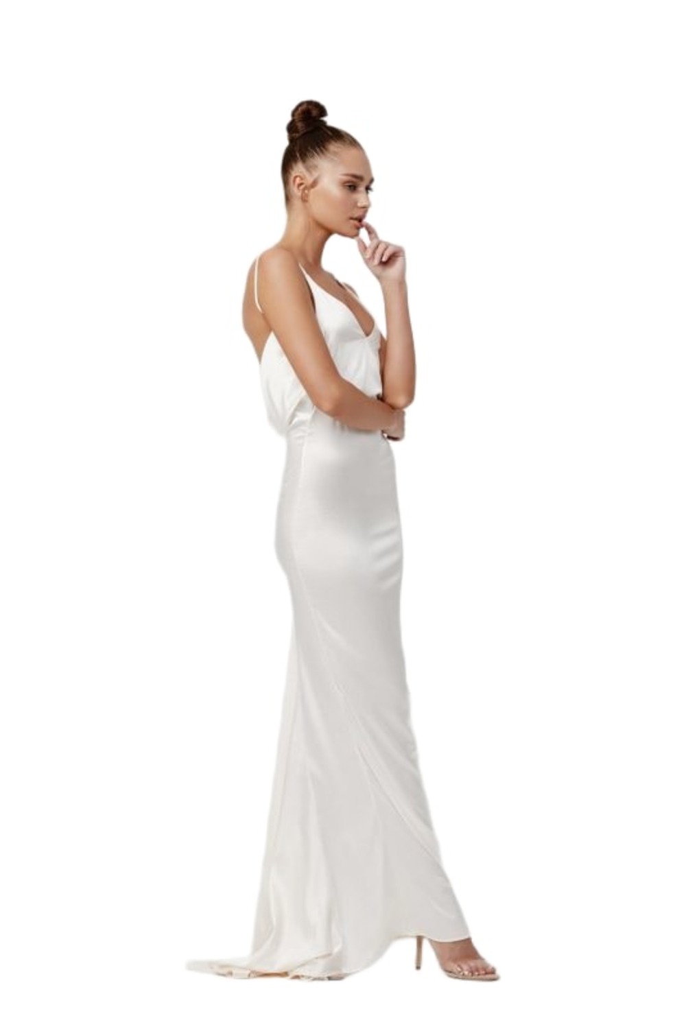 Model wearing Lexi Gabrielle cream bias-cut satin slip gown with subtle train