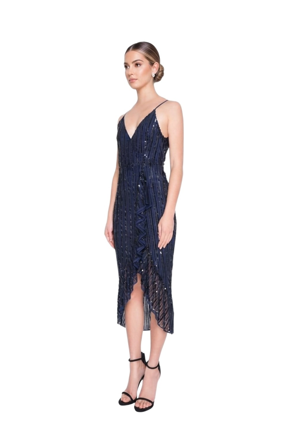 Model wearing Madame X Siyana navy striped sequin midi with ruffle hem