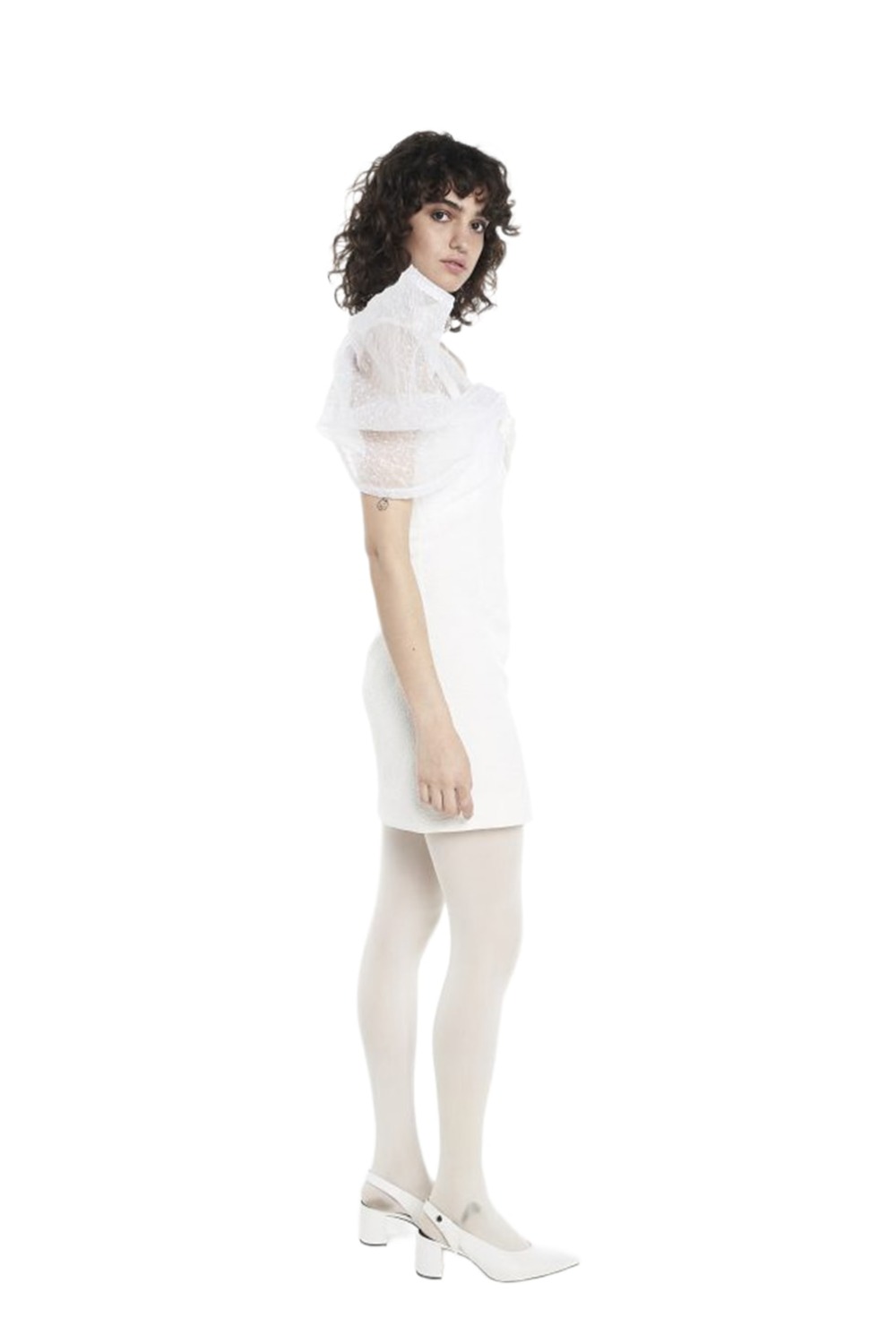 Model wearing Nicola Finetti Zoe white textured strapless mini with shoulder ruffle