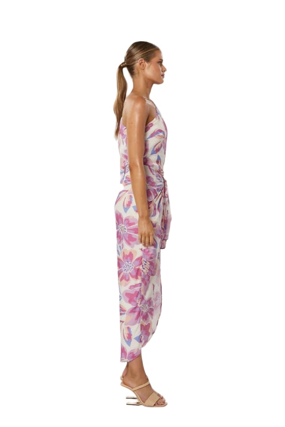 Model wearing Winona Audra lilac floral one shoulder wrap maxi with high split