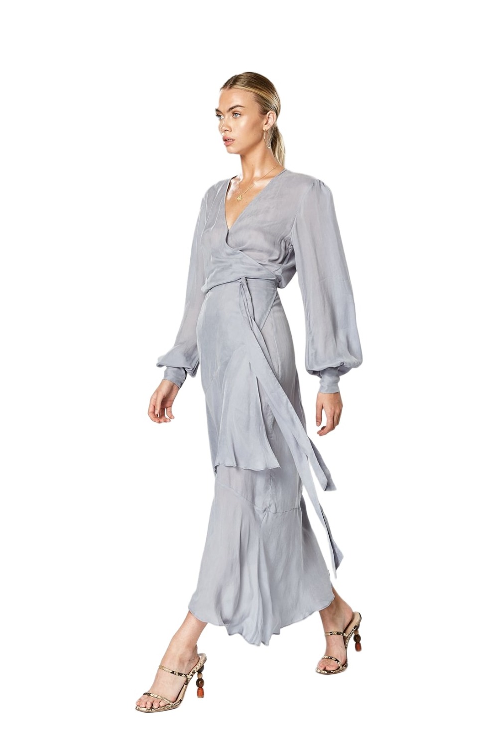 Model wearing Winona Cosmo dusty blue midi wrap dress with ruffle hem while walking